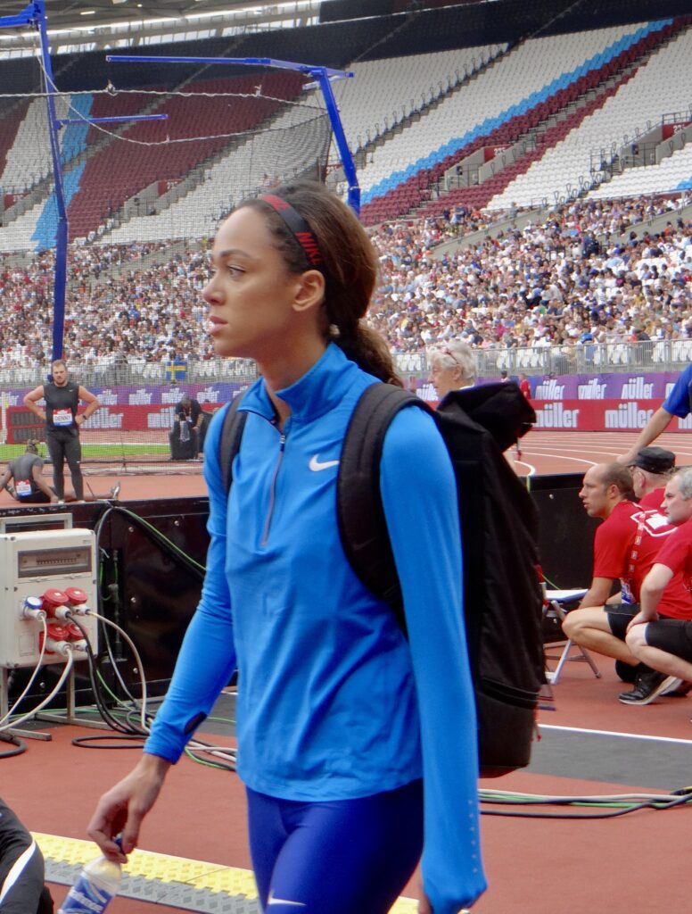 Katarina Johnson-Thompson in her tracksuit waiting for the next heptathlon event.