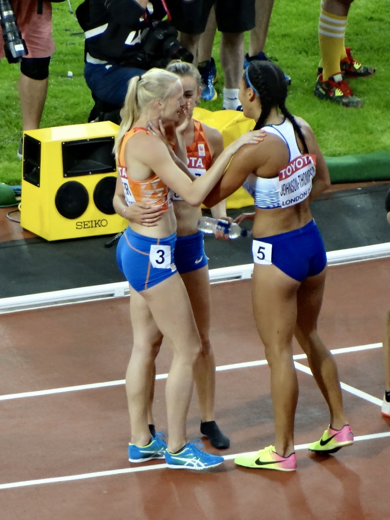 Katarina Johnson-Thompson chatting with other heptathletes after an event
