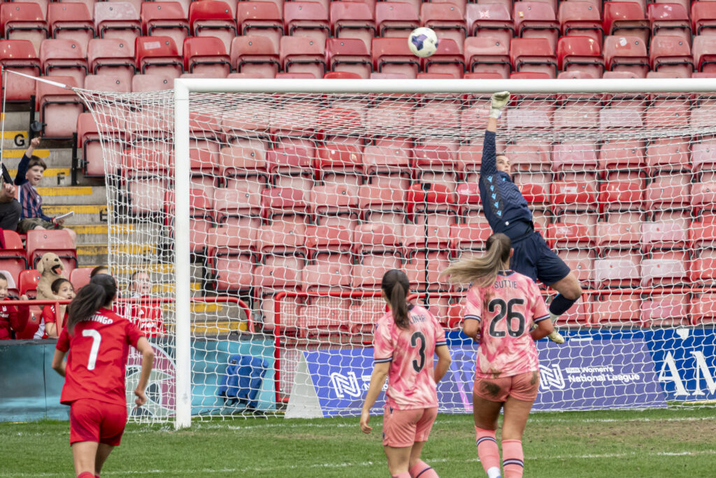 Stoke City's goalkeeper making a dramatic over the bar save in their FAWNL Cup final against Nottingham Forest last season.
