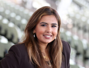 PURPLE REIGN – Nikki Chaudhuri takes her seat beyond the boundary